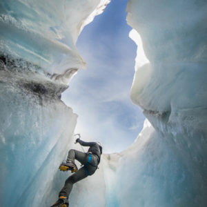 2, sæti klifurflokks: Virgil Reglioni - „Rise from the Deep: Hanging deep in this bottom-less moulin, shooting from below, this shot brought me such an incredible experience photographing. The conditions were hard, hanging low on an uncomfortable position, ice particles falling down on me and my gears, i was trying to hold my balance with one hand, holding the ice axe jammed in the ice wall in front of me and shooting with the other one."